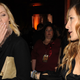 The woman in the middle of this photo is us. Image via Getty.